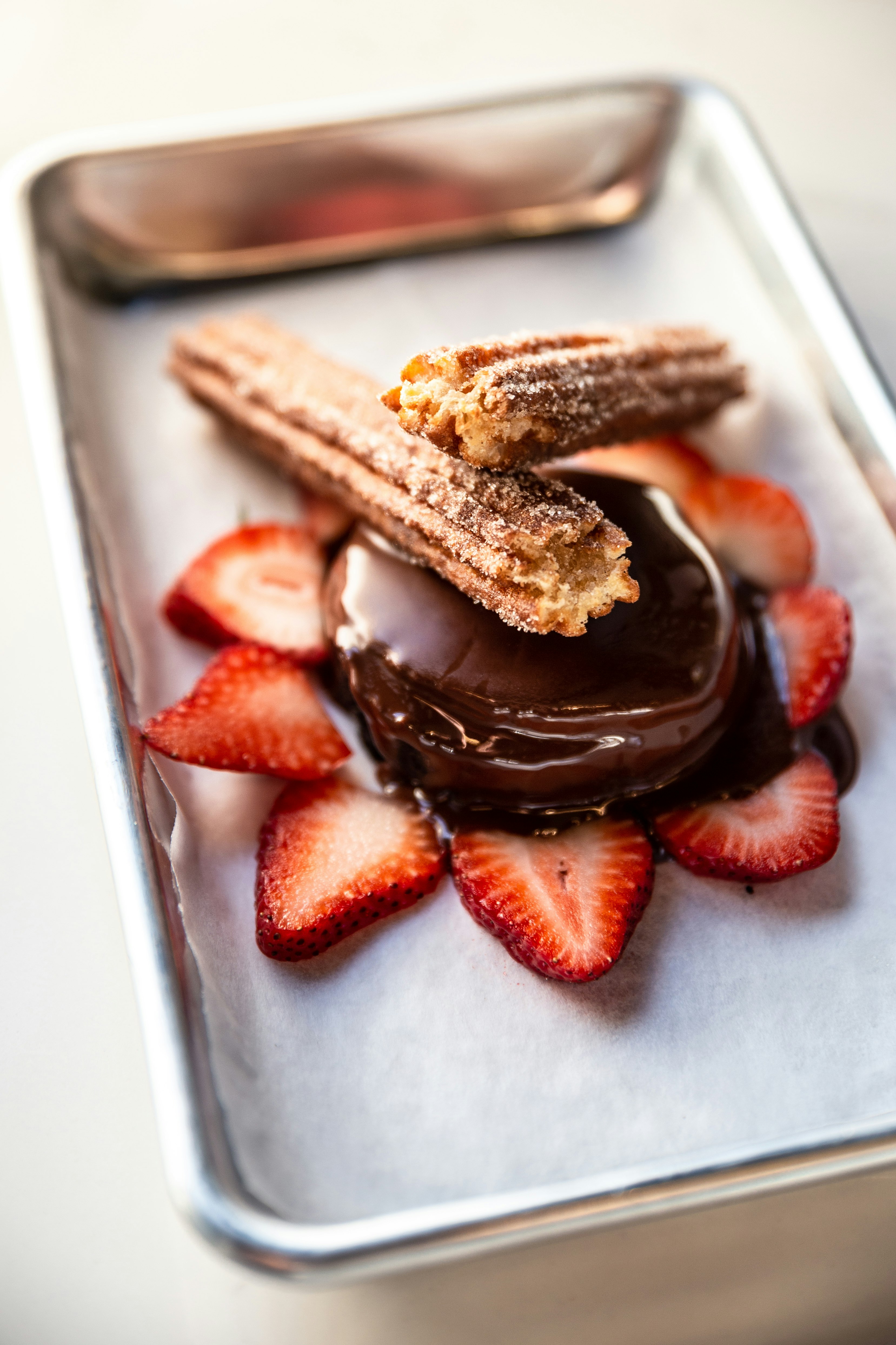 chocolate cake with sliced strawberry fruits